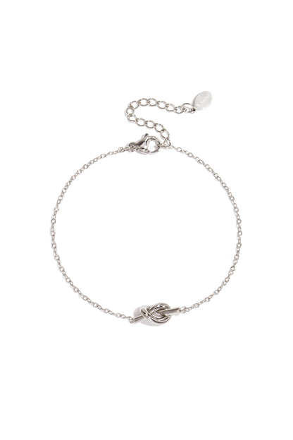 Simple bracelet with knotted charm